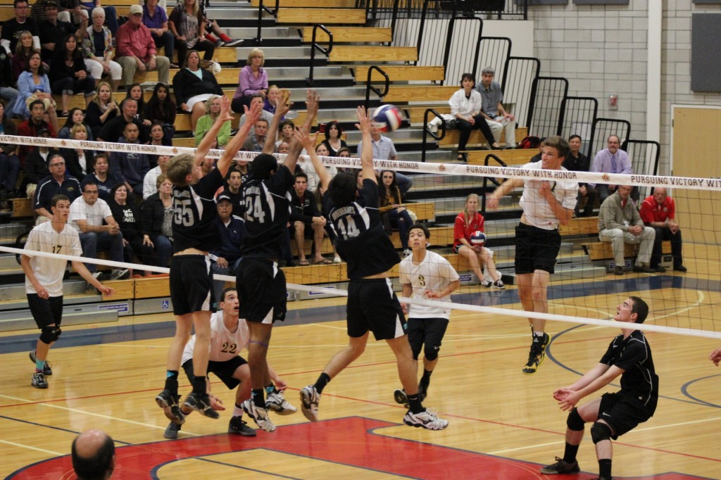 DV goes up for the block in their game against Archbishop Mitty. by Ronald Rivera