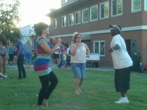 Rose Vargas, Eva Rizo and Paul Davis dance to the sounds of Tuck & Roll.