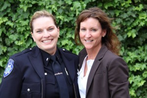 Acting Captain Aguinaga (left), who was awarded the Distinguished Service Award, with Lt. Robin Kelley.