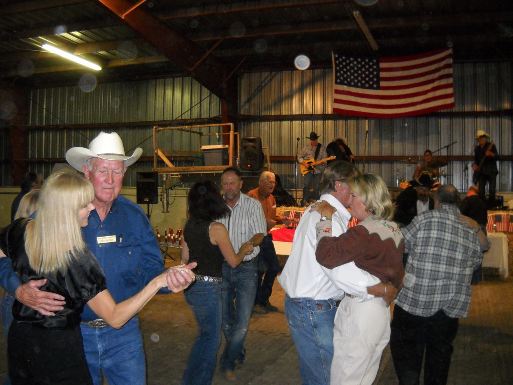 Guests dance at the 2012 Roddy Ranch Roundup. Jack Roddy in the cowboy hat, right.