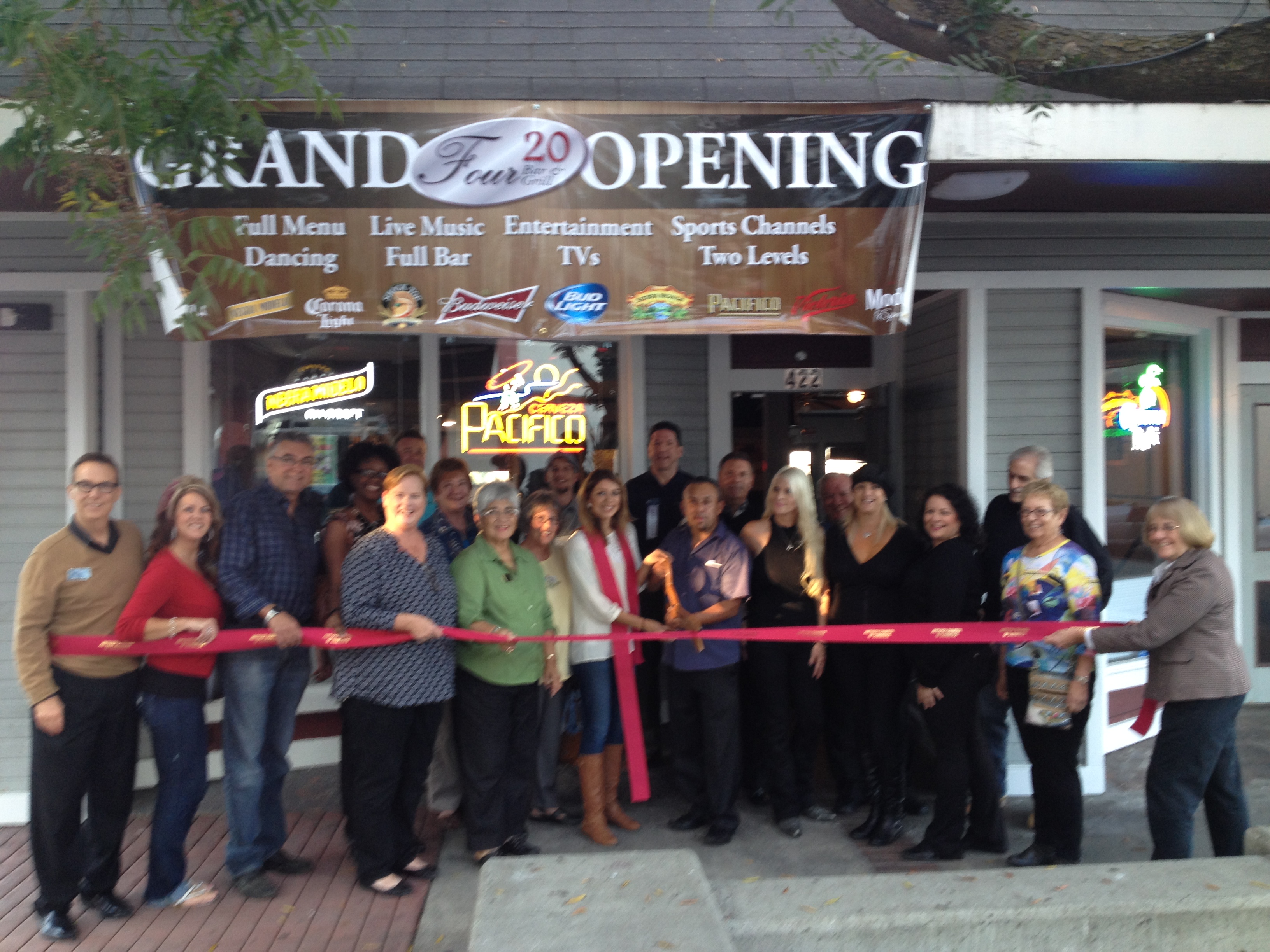 Chamber of Commerce and City Council representatives help Antioch's new owners and staff of 420 Bar & Grill cut the ribbon on Thursday, November 6th.