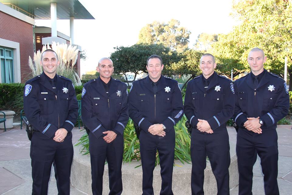 To the left of Chief Cantando are Officers Matt Hirsch and Mark Moraga. To his right are Officers Jonathan Adams and Randall Gragg. photo courtesy of APD.