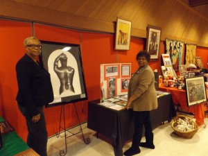 Janet Thompson and Beverly Bruce of Ruah Community Outreach, Inc. with one of the displays