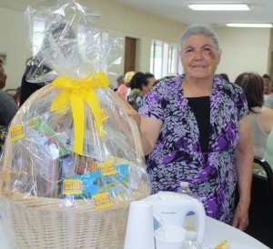 One grandma with the gift basket she won