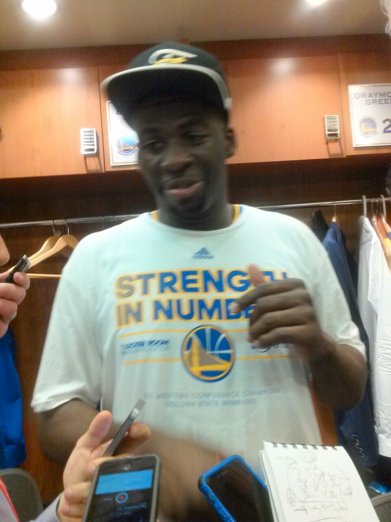 Draymond Green in the locker room celebrating the Warriors' victory, Wednesday night. photo by F.D. Purcell