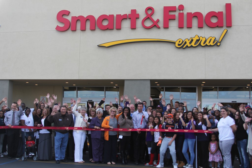 Smart & Final Antioch Store Manager Robert Scholl cuts the ribbon with members of the Antioch City Council and Antioch Chamber of Commerce on Wednesday, May 13, 2015.