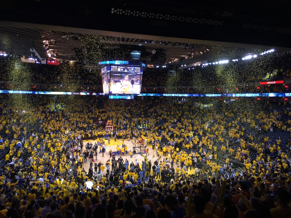 Confetti falls on the crowd after the Warriors beat the Grizzlies in Game 5 of the Western Conference Semi-Final series. photo by Allen Payton