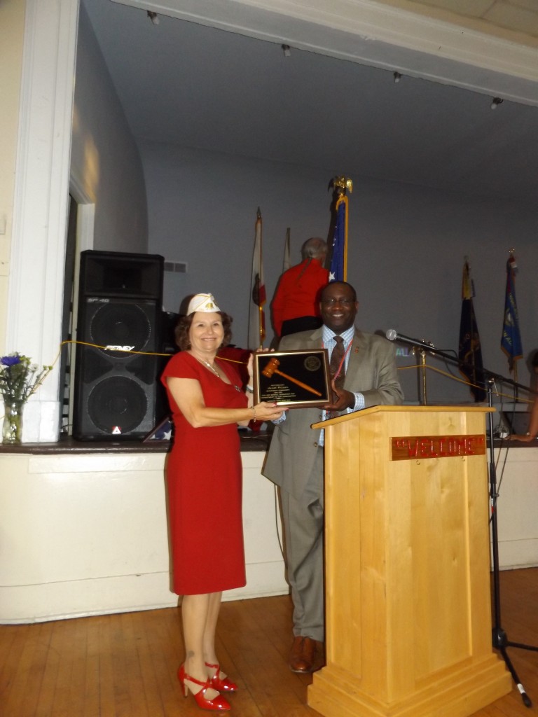 State Commander Janet Wilson presented a plaque by Antioch Post Vice Commander Autrey James at the dinner in her honor, Saturday night, June 6.