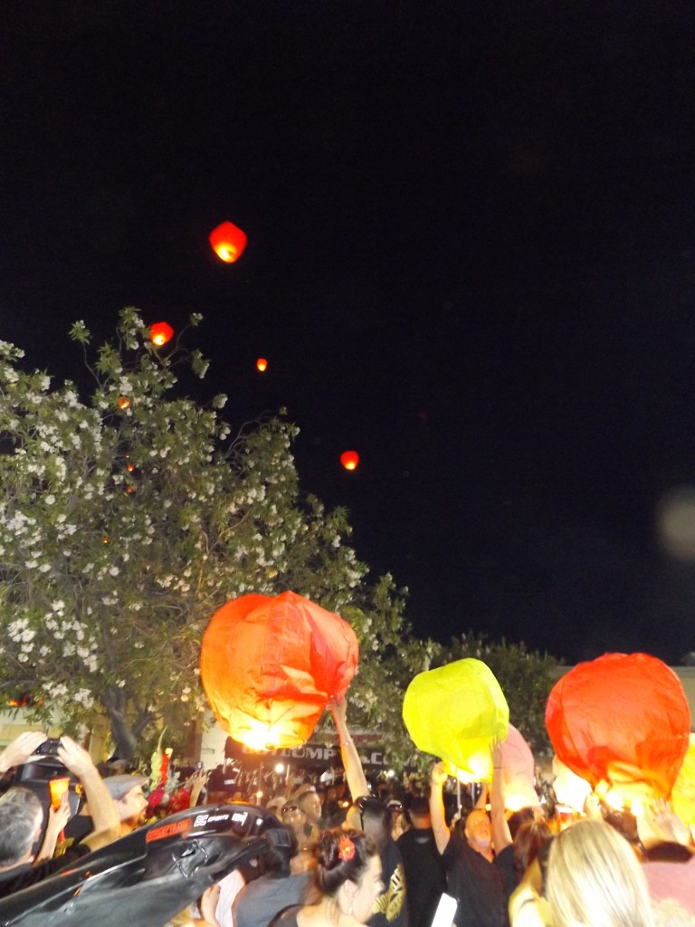 The lanterns rise into the sky on the windy evening in memory of Jeremy "Lumpy" Sturgill, Friday night, June 19, 2015.