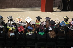 Dozier-Libbey Class of 2015 graduates with their decorated caps. photo by Luke Johnson