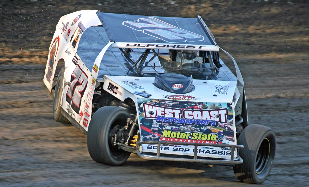 (071815) Antioch Speedway Action - Shawn DeForest of Livermore slides through the high-banked turns of the Antioch Speedway clay oval in route to winning the IMCA modified feature Saturday night.  (Antioch, CA)