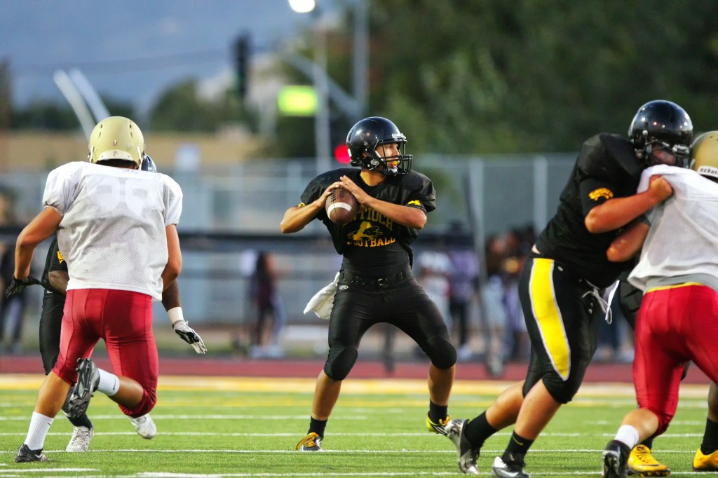 Antioch High quarterback, junior #4 Abram Karnthong, in scrimmage vs. Northgate, Friday, August 21, 2015. photo by Luns Louie, DeltaSportsMag.com.