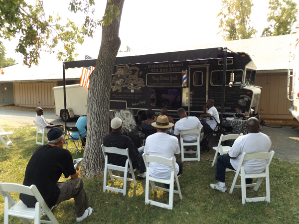 Veterans watch a movie at Stand Down on the Delta.