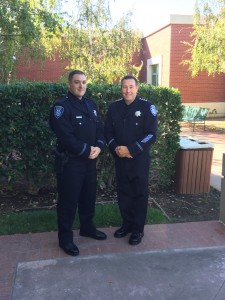 Officer Justin Hamilton and Chief Allan Cantando.