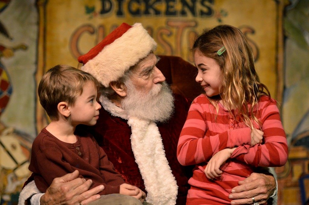 Good girls and boys share their holiday wishes with Father Christmas at the Great Dickens Christmas Fair & Victorian Holiday Party.