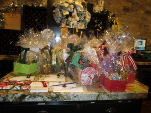 Some of the gift baskets created by Amy Dopart of Strategic Threat Management auctioned off at their annual holiday party in December.