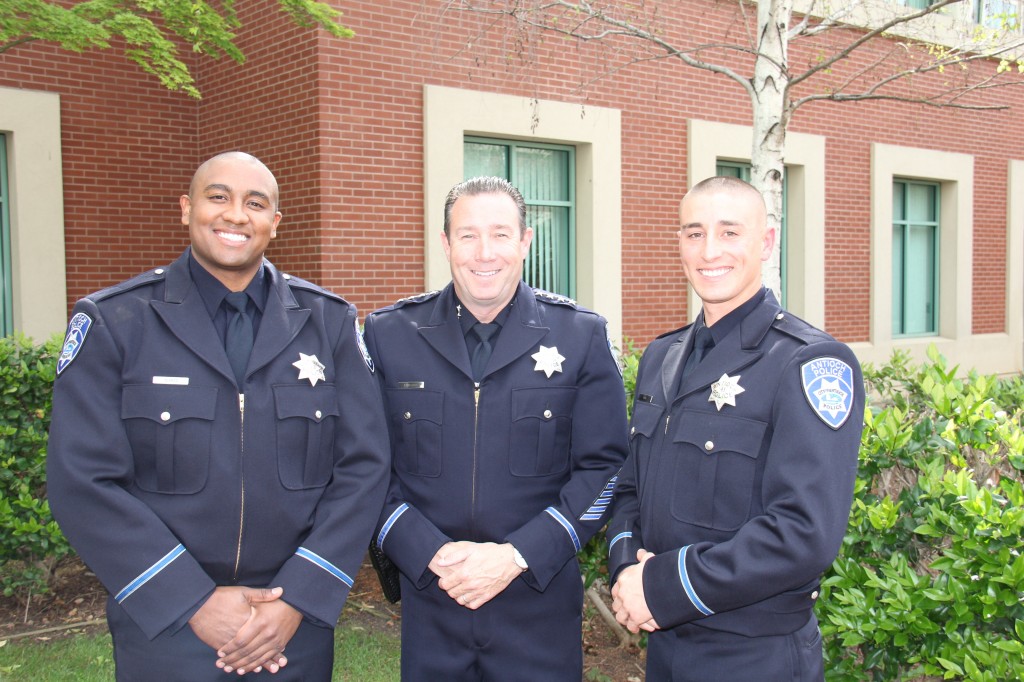 New Antioch Police Officers German Blanco, left and Chris Motle, with Chief Allan Cantando following their oath of office ceremony, Monday, March 21. photo by APD