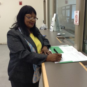Filing her papers at the County Elections Office on Wednesday, March 9th.