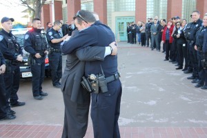 Orman receives a big, farewell hug from longtime friend and fellow officer, Antioch Police Chief Allan Cantando. photo courtesy of APD