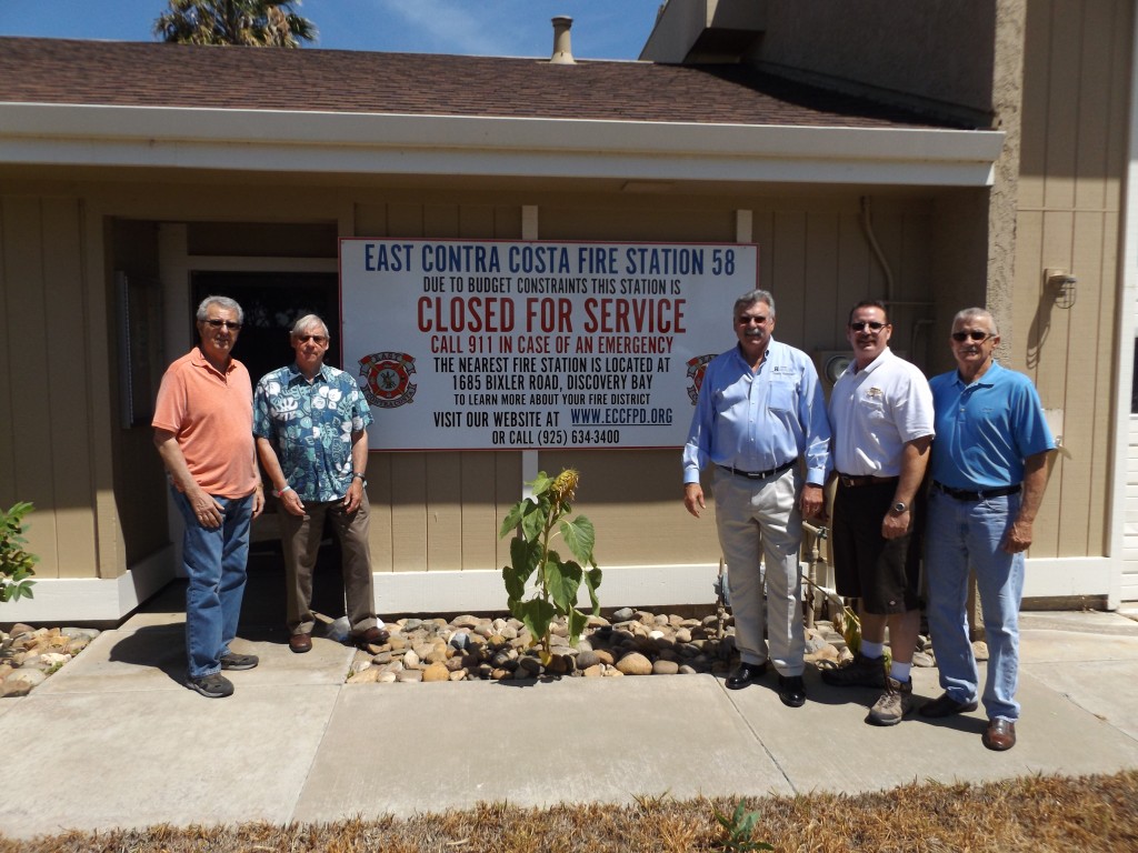 Members of the East County Voters for Equal Protection Phil Mora, Hal Bray, Rob Broocker and Bob Bay, with Doug Hardcastle (center) at the closed fire station in Discovery Bay.