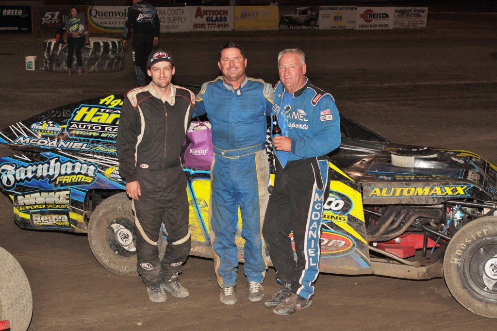 The A Modified Main Event Podium for the Jerry Hetrick Memorial Race.  Left to right is Cody Burke (second place), Darrell Hughes II (third place) and Randy McDaniel (first place).  Photo By Paul Gould Photography