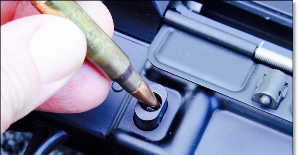 A formerly California-legal bullet button on a semiautomatic rifle. (www.gunsamerica.com)