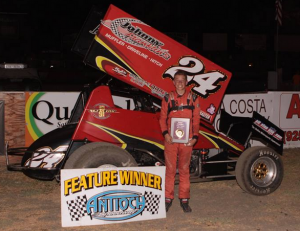 Fourth generation racer Colby Johnson #24 became the 11th different Winged 360 Sprint Car Main Event winner of the season.  Photo By Paul Gould