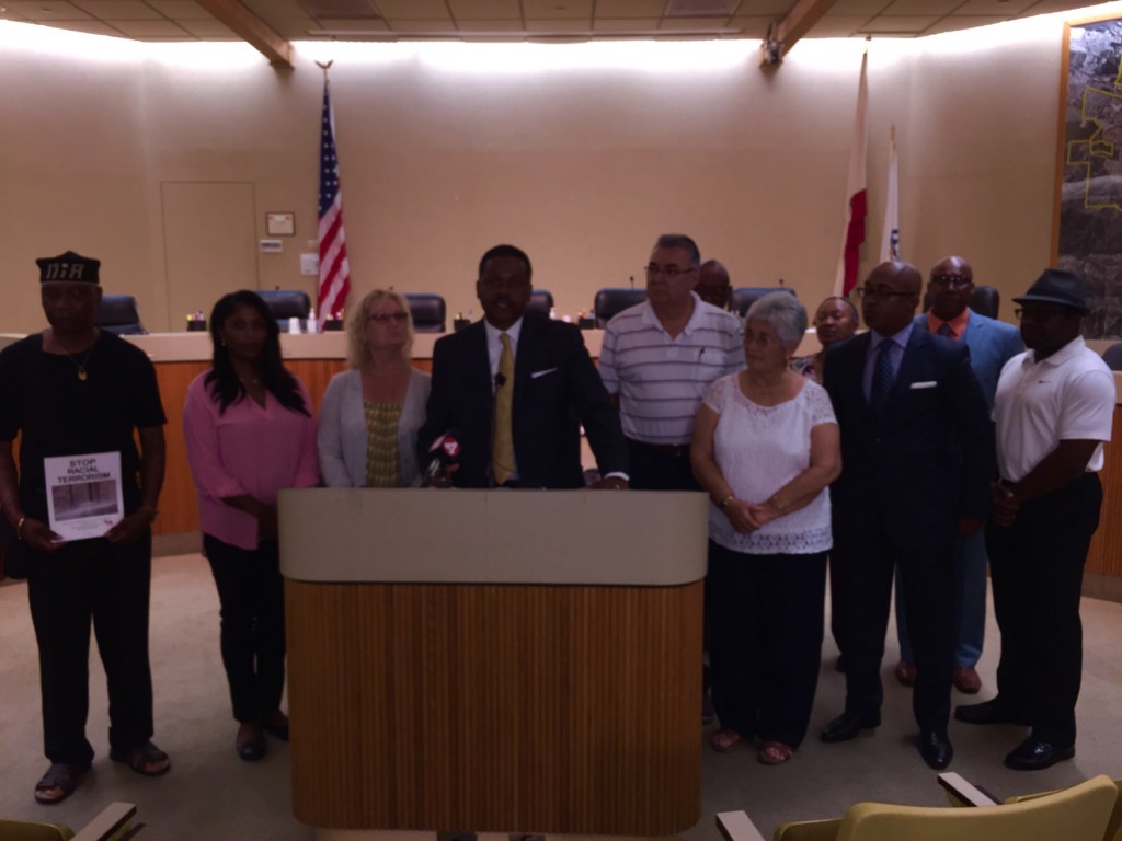 Antioch Mayor Wade Harper, center, is joined by all four members of the Antioch City Council, other community leaders including representatives of the faith community and the NAACP at a Thursday afternoon press conference about the hate crime in Antioch, on Wednesday morning.