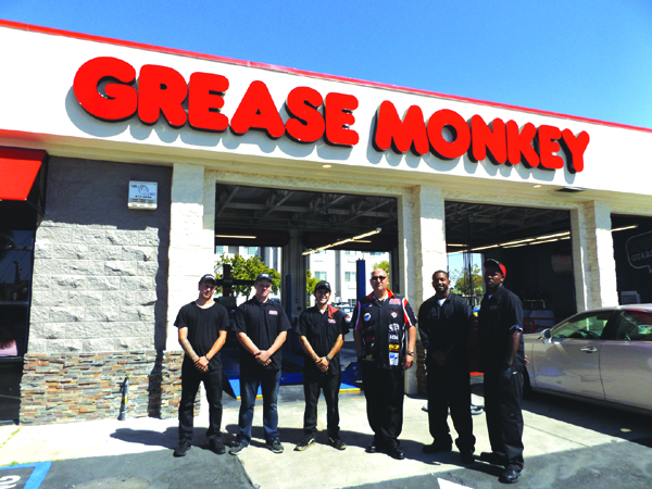 Manager Carlos Badial and his Grease Monkey crew are ready to serve you.