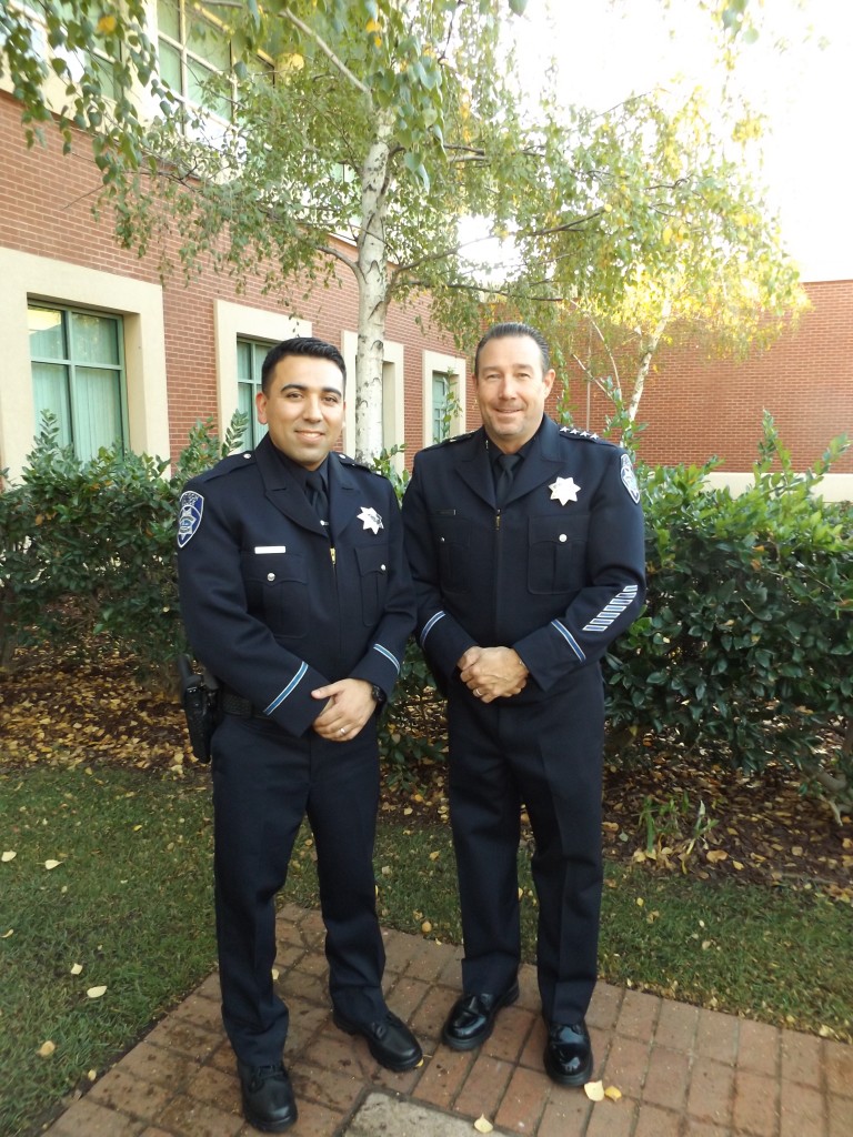 Antioch's newest Police Officer Steven Millan-Estrada and Chief Allan Cantando, following Millan's oath of office ceremony, Monday afternoon, November 14, 2016.