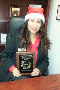 Pacific Senior Care Services owner Kelly Gonzales with the 2016 award from Best Businesses of Walnut Creek.