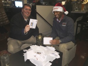 Mayor Sean Wright and Mayor Pro Tem Lamar Thorpe draw the first two prize winners from the pile of ballots in the contest.