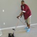 Travis Moorer cleaning carpet