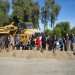 Officials turn the dirt to break ground