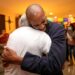 Thorpe hugs his father