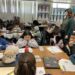Third graders read along